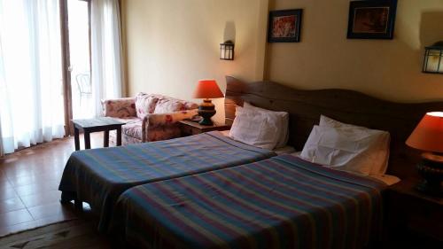 Ein Bett oder Betten in einem Zimmer der Unterkunft Nakhil Inn Nuweiba