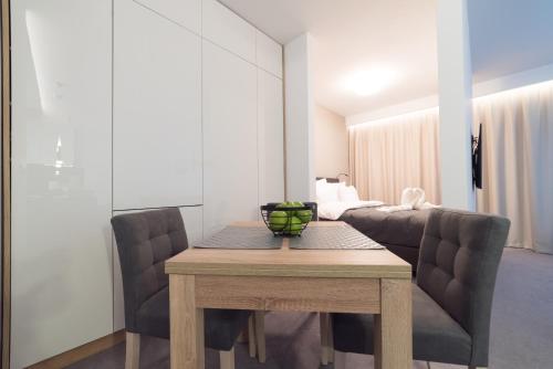 Ένα ή περισσότερα κρεβάτια σε δωμάτιο στο Apart-Hotel VIVI RESIDENCE & SPA