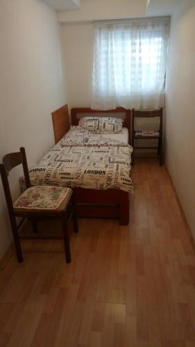 Postel nebo postele na pokoji v ubytování Apartments Vozdovac