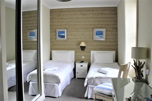 Krevet ili kreveti u jedinici u okviru objekta Seascale Hotel & Restaurant