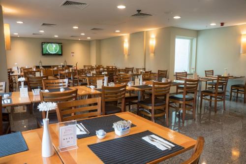 Restaurace v ubytování Plaza Rio Residences - Barra First
