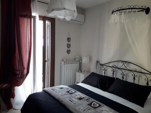 Postel nebo postele na pokoji v ubytování Via Roma 224