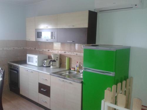 A cozinha ou kitchenette de József Apartman