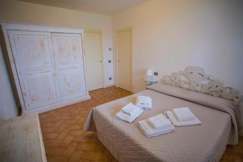 Ένα ή περισσότερα κρεβάτια σε δωμάτιο στο Residence Karina