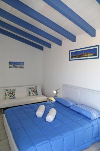 Katil atau katil-katil dalam bilik di B&B COSTA