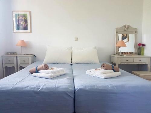 Ένα ή περισσότερα κρεβάτια σε δωμάτιο στο Casa Di Mare