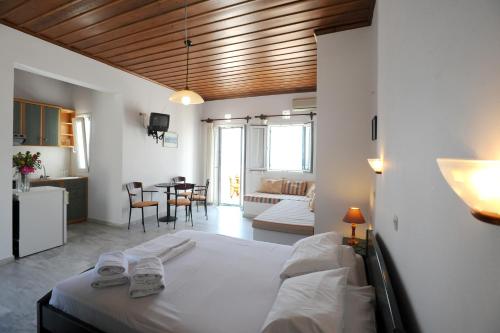 Postel nebo postele na pokoji v ubytování Carlo Bungalows