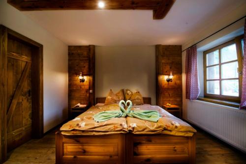 Ένα ή περισσότερα κρεβάτια σε δωμάτιο στο Chata Piecky