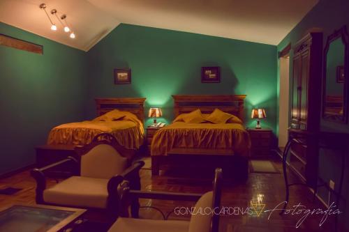 Ένα ή περισσότερα κρεβάτια σε δωμάτιο στο Hotel Santa Mónica