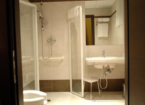 Koupelna v ubytování Hotel Alverì