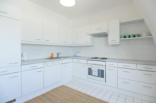 Central Living Apartments - Rathausにあるキッチンまたは簡易キッチン