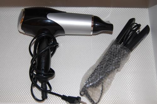 a hairdryer and a hair dryer on a table at Zamoyskiego in Krakow