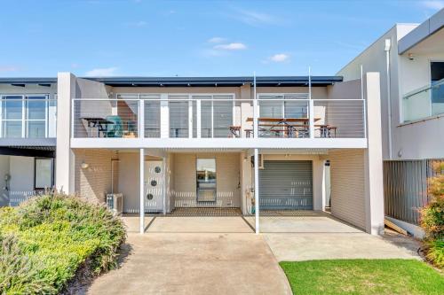 an image of a house with a balcony at Queensland South - Aldinga Beach - C21 SouthCoast Holidays in Aldinga Beach