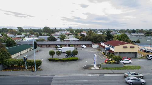 an aerial view of a town with a parking lot at Blenheim Road Motor Lodge in Christchurch