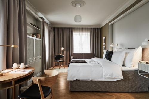 Postel nebo postele na pokoji v ubytování Hotel St. George Helsinki