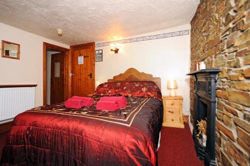 Ένα ή περισσότερα κρεβάτια σε δωμάτιο στο The West Country Inn
