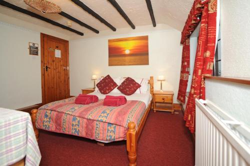 Ένα ή περισσότερα κρεβάτια σε δωμάτιο στο The West Country Inn