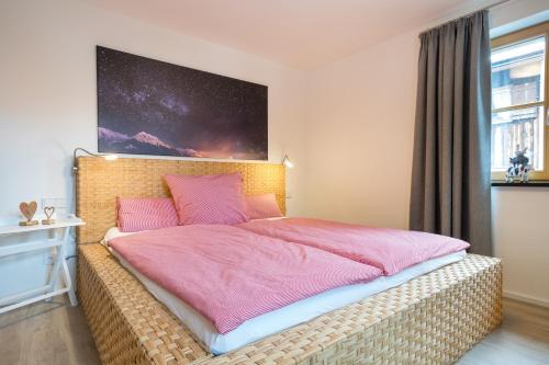 מיטה או מיטות בחדר ב-Alpin Lodge