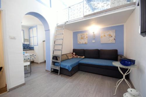 Кровать или кровати в номере Appartamento Manola