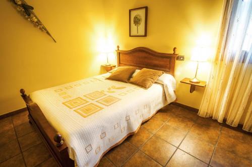 A bed or beds in a room at Casa Rural Ekoigoa