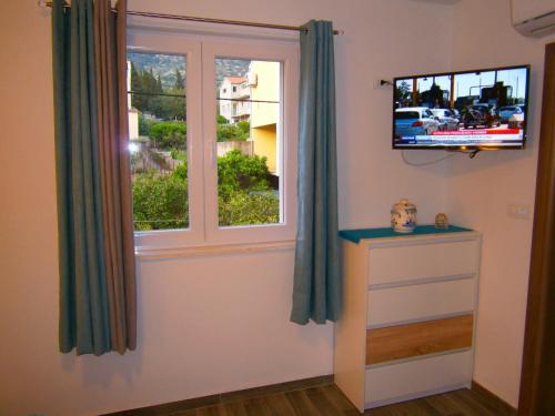 TV a/nebo společenská místnost v ubytování Room Vilma