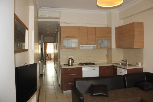 Virtuve vai virtuves zona naktsmītnē Taksim House Suites