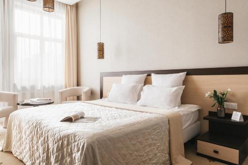 Кровать или кровати в номере Ark Palace Hotel & SPA