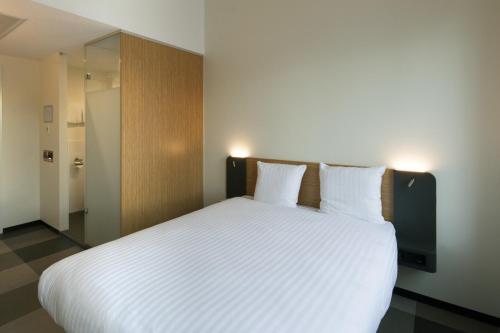 Katil atau katil-katil dalam bilik di easyHotel Maastricht City Centre