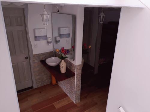 Ein Badezimmer in der Unterkunft Elizabetha Hostal