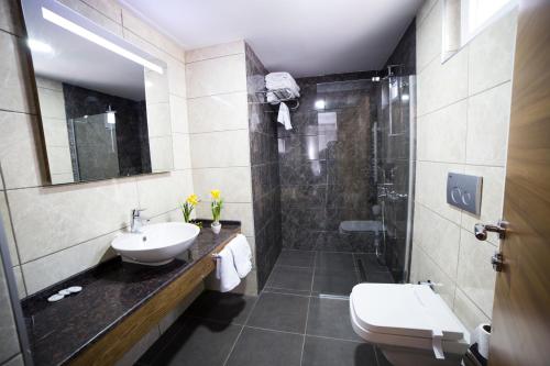 Kúpeľňa v ubytovaní MD Barbaros Hotel