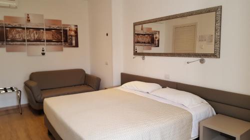 Cama o camas de una habitación en Hotel Pace