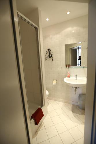 Koupelna v ubytování Hotel AI Königshof
