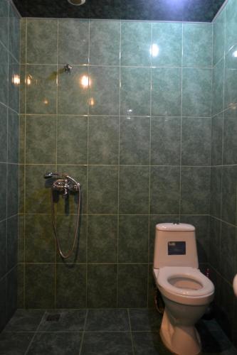 Koupelna v ubytování Hotel Nirvana