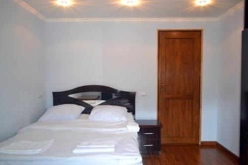 Postel nebo postele na pokoji v ubytování Hotel Nirvana