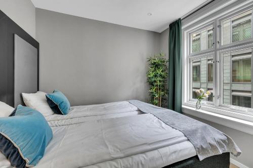 Postel nebo postele na pokoji v ubytování Forenom Serviced Apartments Oslo Opera