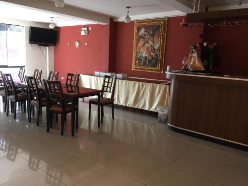 Televisyen dan/atau pusat hiburan di Apart Hotel Incamin