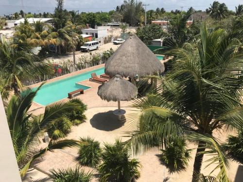 an aerial view of a resort with a swimming pool at Playa Chacá in Progreso