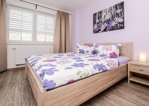 Postel nebo postele na pokoji v ubytování Spreewaldapartments-Kossatz