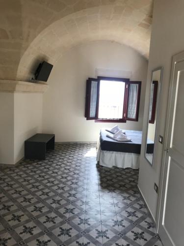 Un ou plusieurs lits dans un hébergement de l'établissement Sine Tempore B&B