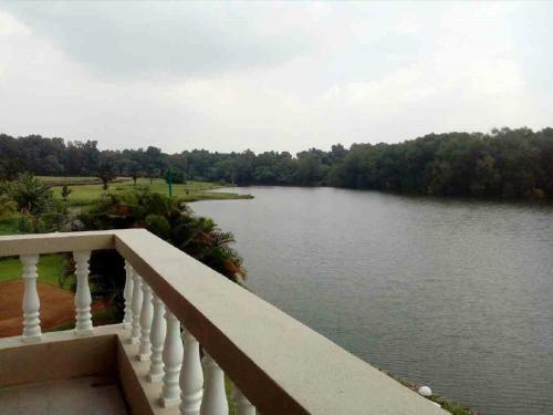 a view of a river from a balcony at Vietnam Golf - Lake View Villas in Ho Chi Minh City