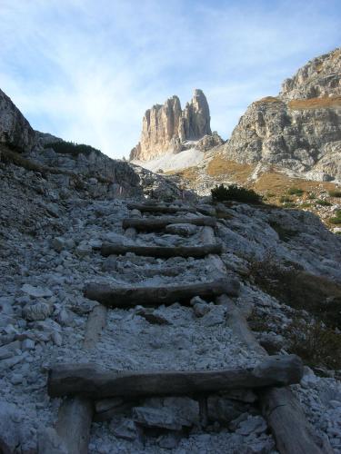 a stone stairway leading up a rocky mountain at Appartments Helvetia in Villabassa