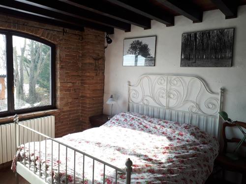 Postelja oz. postelje v sobi nastanitve La Casa Sopra Le Nuvole