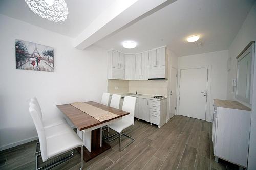 Kuchyň nebo kuchyňský kout v ubytování Sea Star Apartment