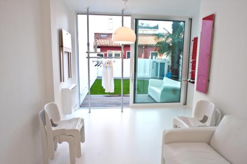 Posezení v ubytování Legrenzi Rooms