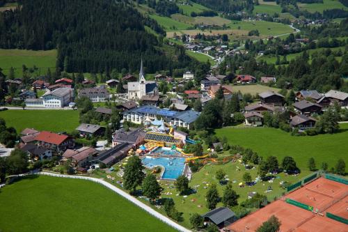 an aerial view of a village with a water park at Haus Florian Appartements in Wagrain