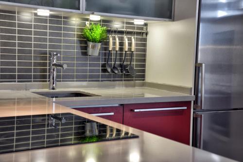 Kuchyňa alebo kuchynka v ubytovaní WonderStays Apartamento La Jabega