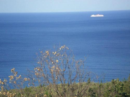 a cruise ship in the ocean with at Dhori House Dhermi in Dhërmi
