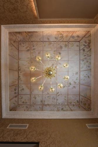 a ceiling with a chandelier in a room at Santa Croce Boutique Hotel in Venice