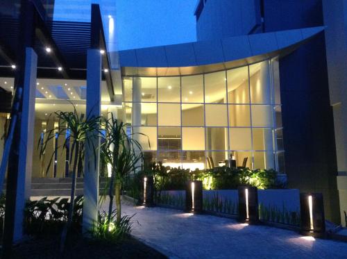 a building at night with lights in front of it at Grand Kecubung Hotel in Pangkalan Bun