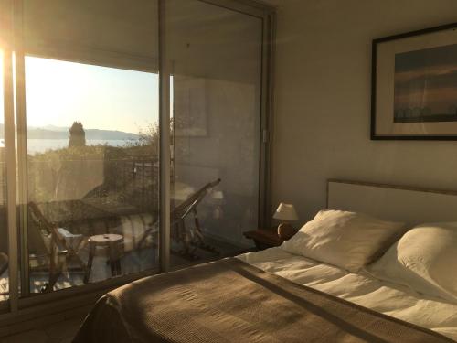 Postel nebo postele na pokoji v ubytování Les Marines Du Soleil